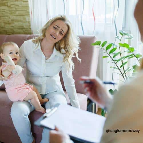 Mother with toddler, clearly upset. Talking to a therapist.