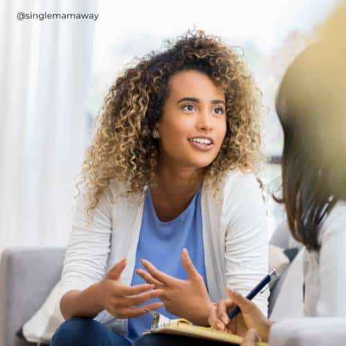 Woman talking to single mother counsellor