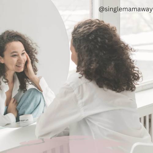 Woman looking at self in moirror