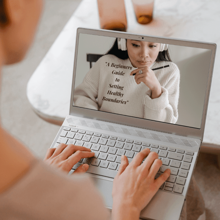 Female accessing ebook guide on laptop