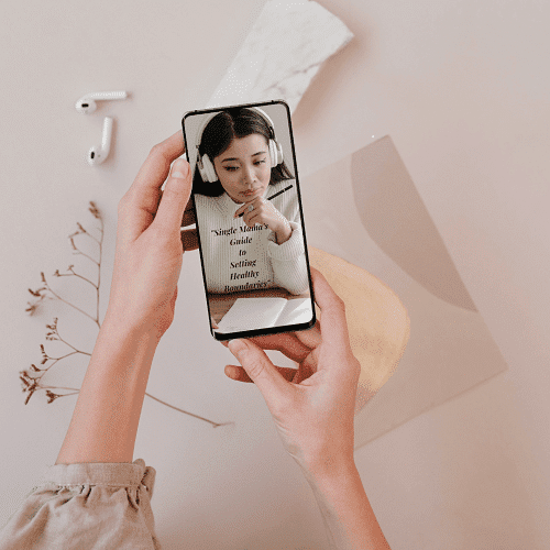 Woman looking at cover of eBook on mobile phone