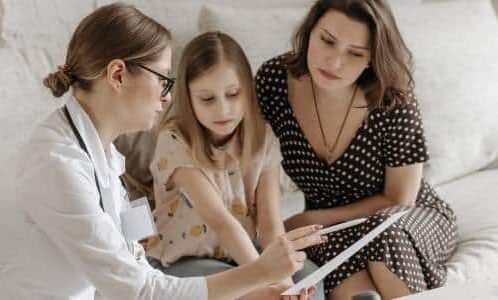 Single Mama Way Family health Mother and daughter talking to female doctor